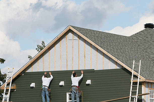 Professional Siding Contractor technician working in Siler City, NC
